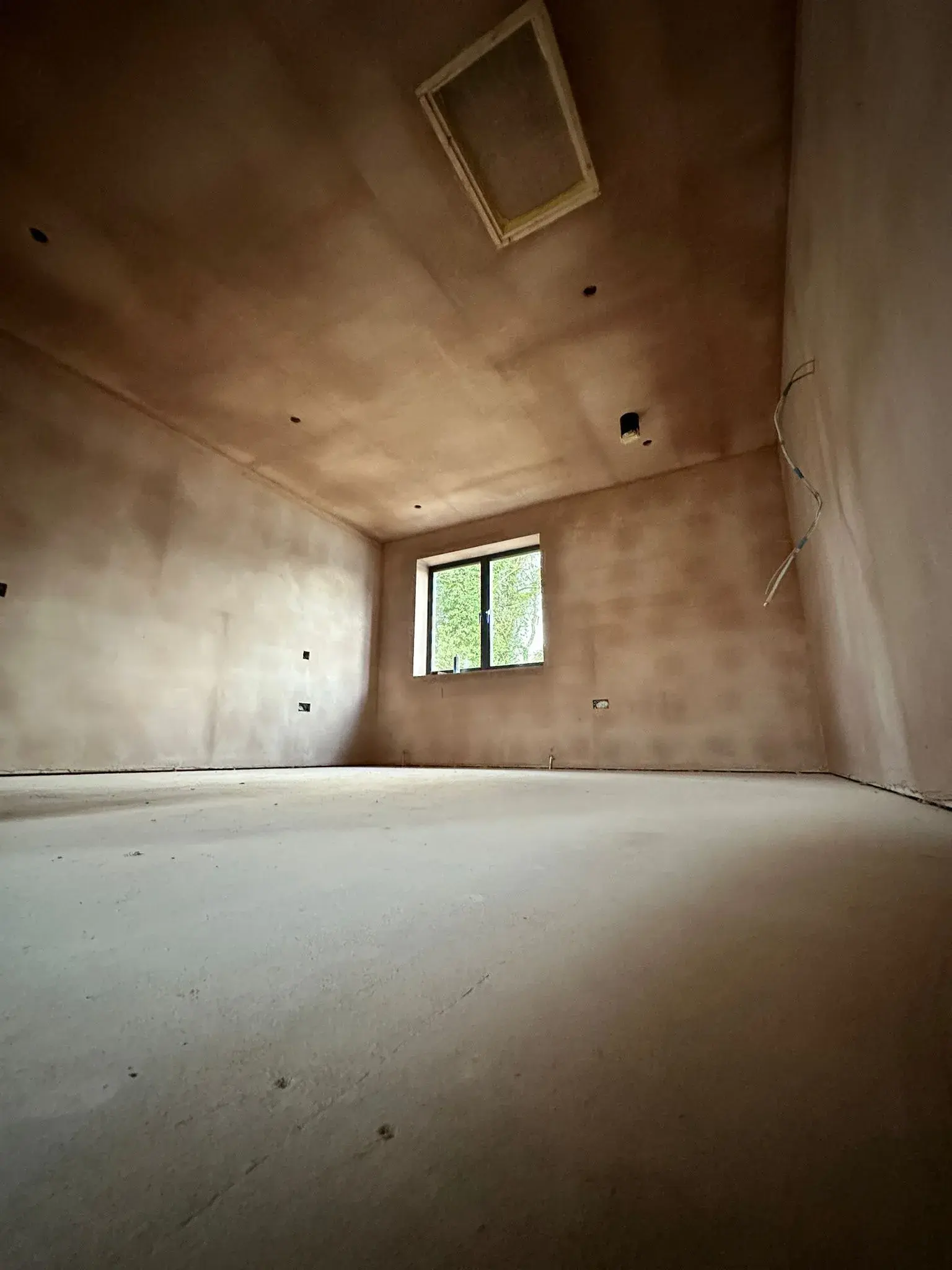 Ceiling plaster repair with clean edges and even finish